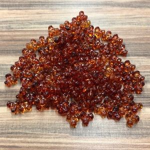 Light brown three sided opaque beads